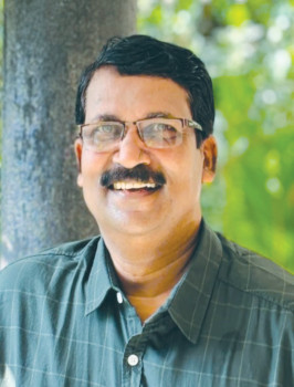 Author portrait: M K Mathai